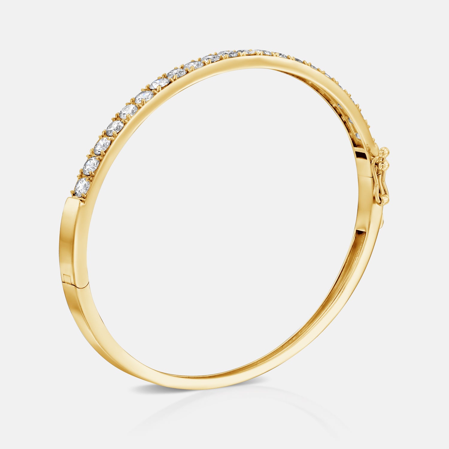 All Day Everyday Bangle in yellow gold, standing vertically with closure and inner bangle detail visible.