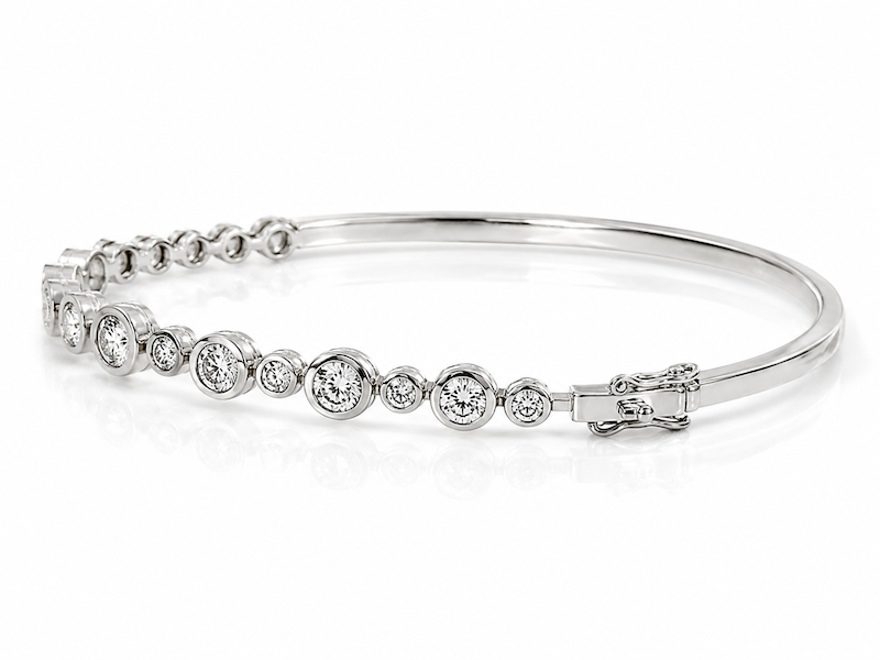 Bubble bezel diamond bangle in white gold 19 diamonds white gold side view of clasp — Waltz Diamonds 
