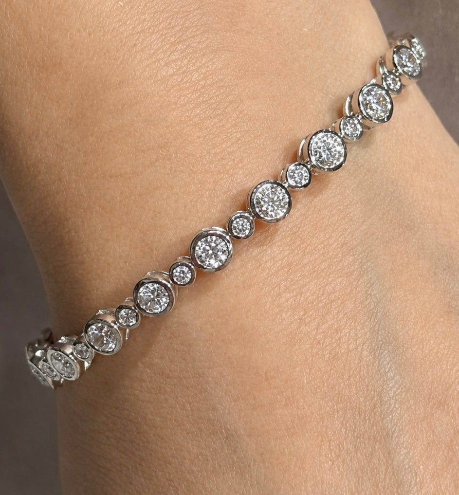 Bubble bezel diamond bangle in white gold 19 diamonds on wrist — Waltz Diamonds 
