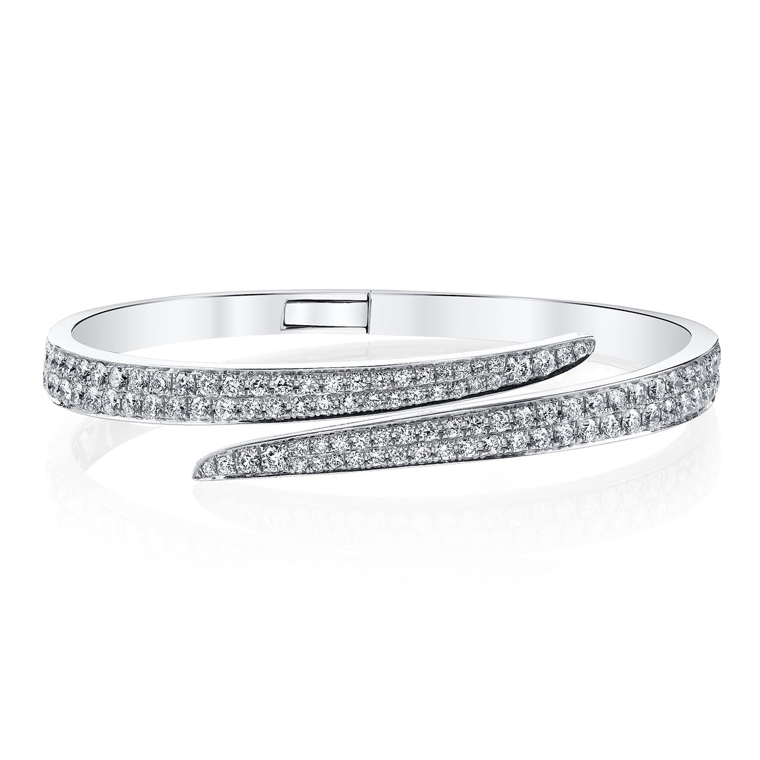 Bypass the Rules diamond bangle in white gold, front product shot showcasing bypass design and pavé diamonds.