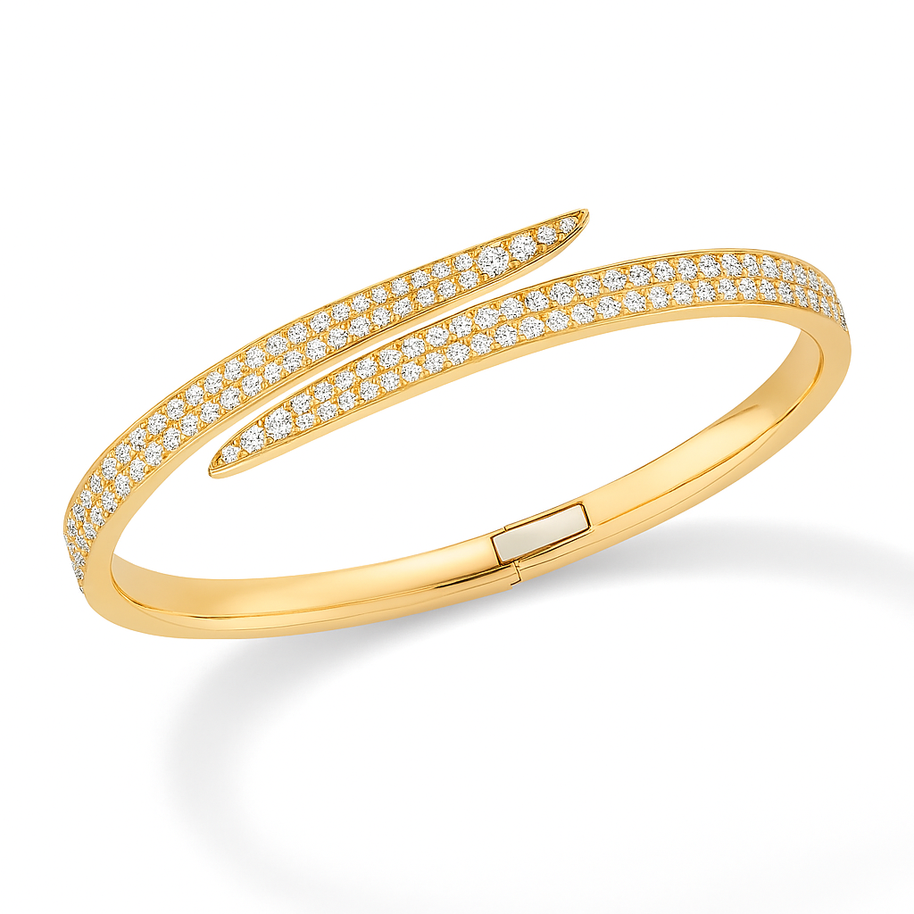 Yellow gold Bypass the Rules diamond bangle shown from a diagonal angle, revealing inner curve and pavé diamond swirl.