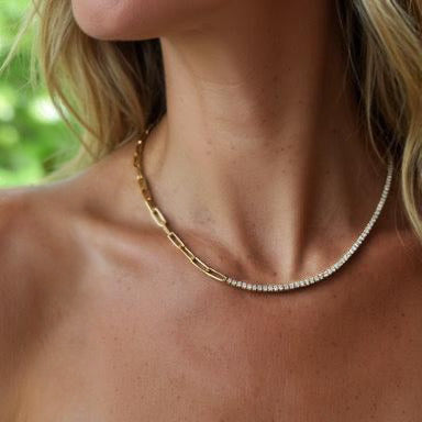 Connected To Source Necklace in yellow gold with open link chain and diamond tennis line, worn by model on collarbone.