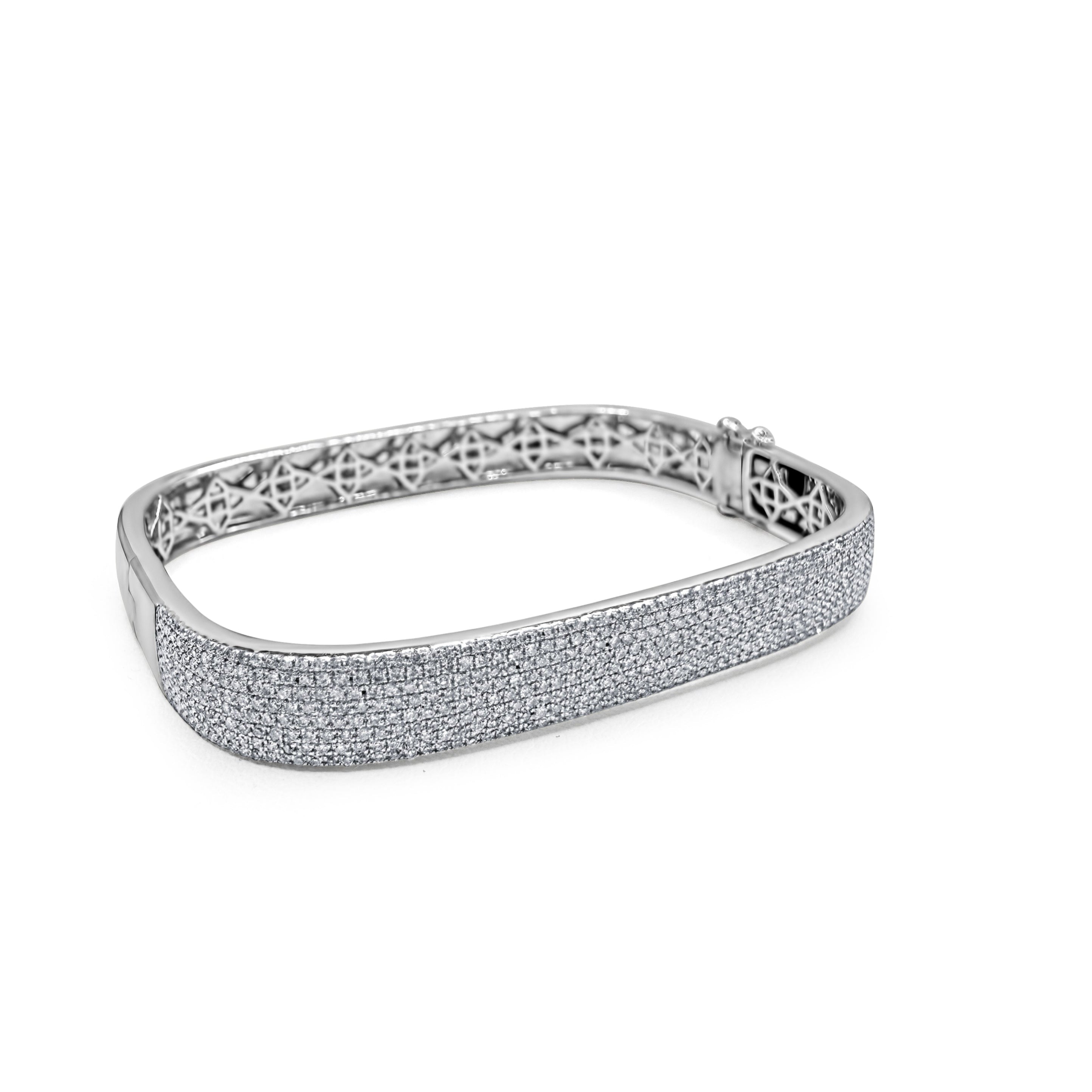 Cuff Me pavé diamond bangle in white gold, product photo showing diamond detailing and inner craftsmanship.