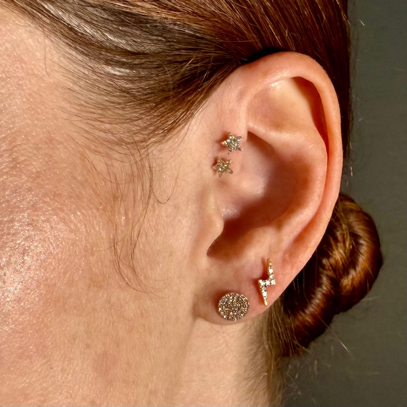 Model wearing Disco Studs pavé diamond earrings, versatile for day or night wear