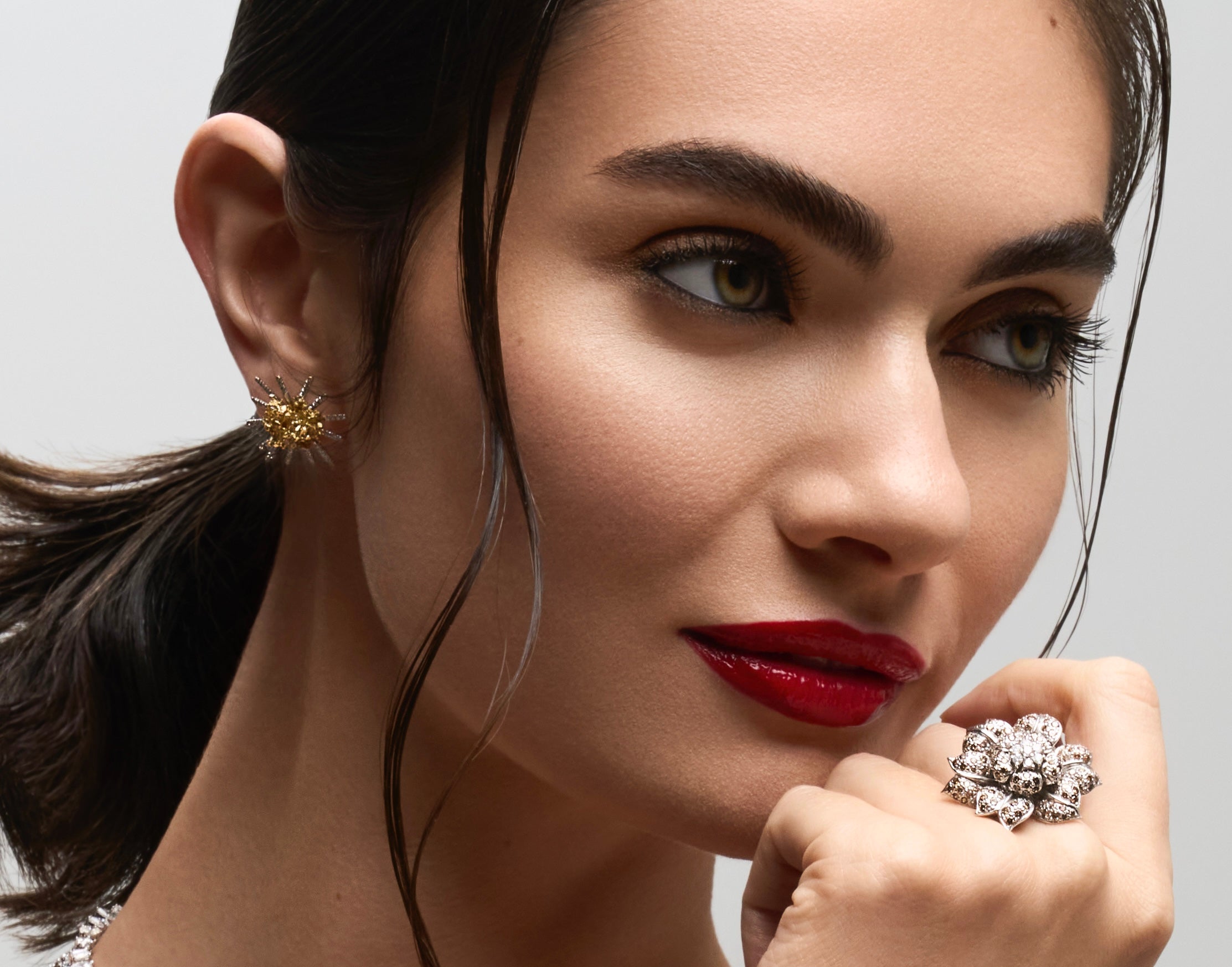 Model wearing Full Bloom Art Deco floral diamond ring on hand