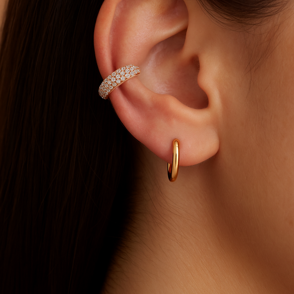 Model wearing intuitive ear cuff  mid ear in rose gold for a layered, intuitive ear stack look