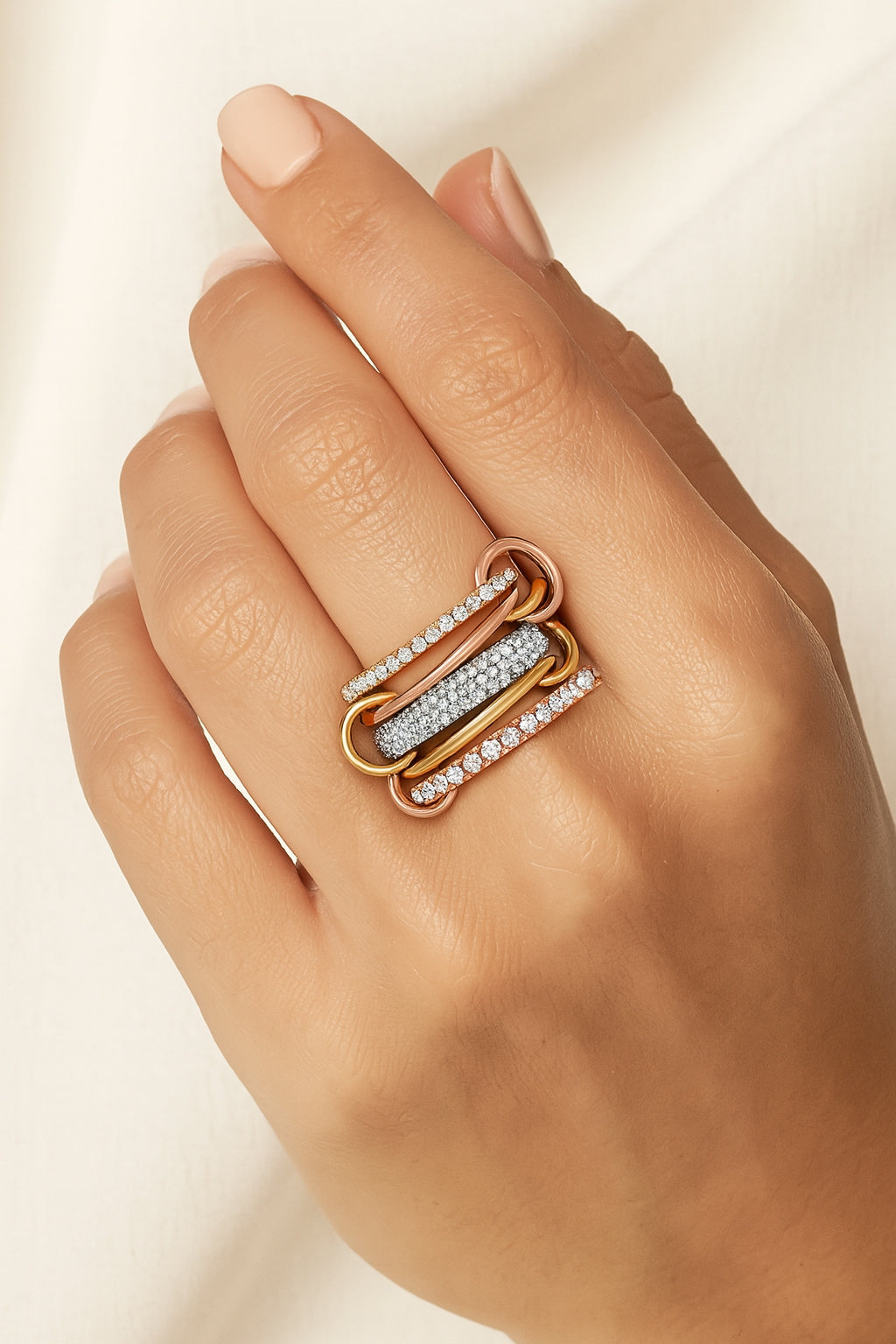Locked and stocked ring shown on models hand