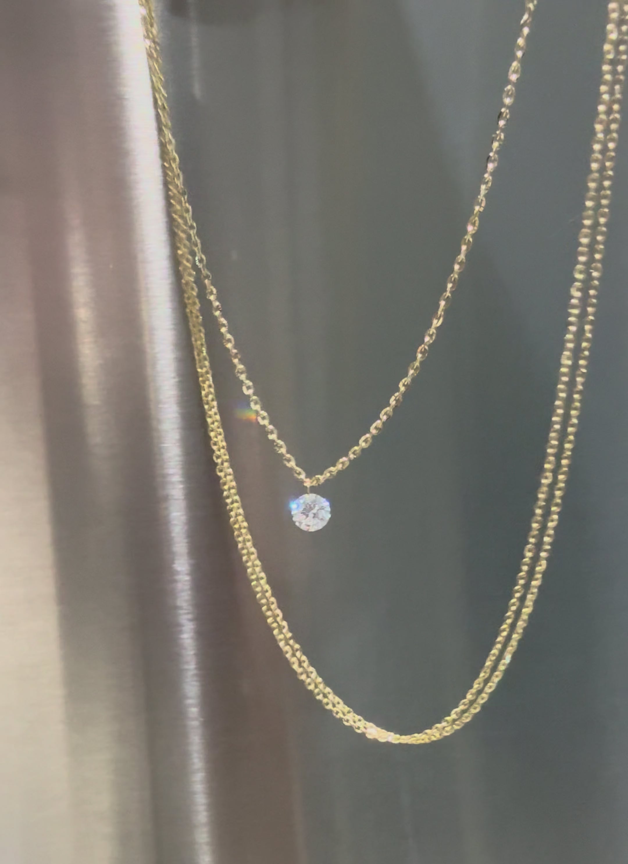 The soloist chains in 14k yellow gold with Adora Daphne necklace—Waltz Diamonds