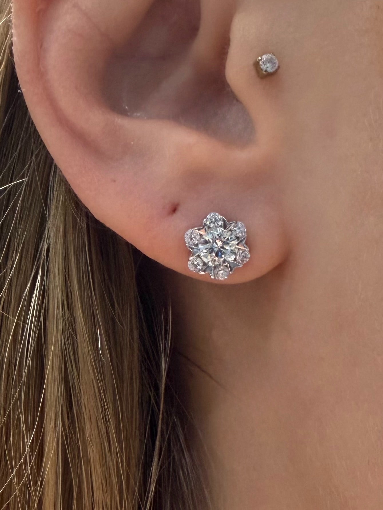 Snowflake Diamond Studs featuring a round diamond surrounded by six other diamonds with v-cut seperation in white gold — Waltz Diamonds