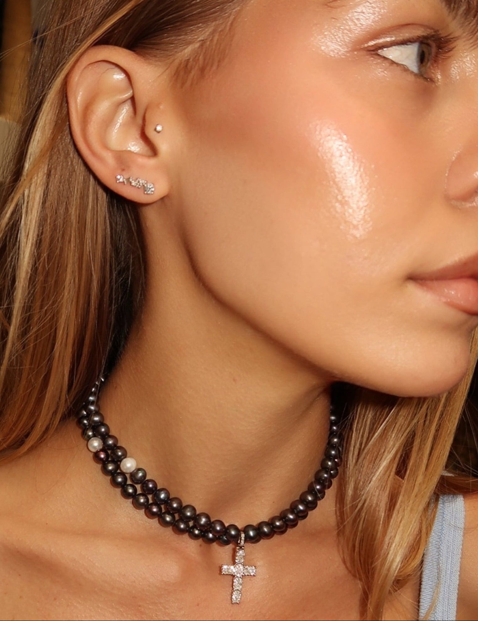 Social Climbers multi-shaped earring on model paired with Holy Water pearl choker—Waltz Diamonds