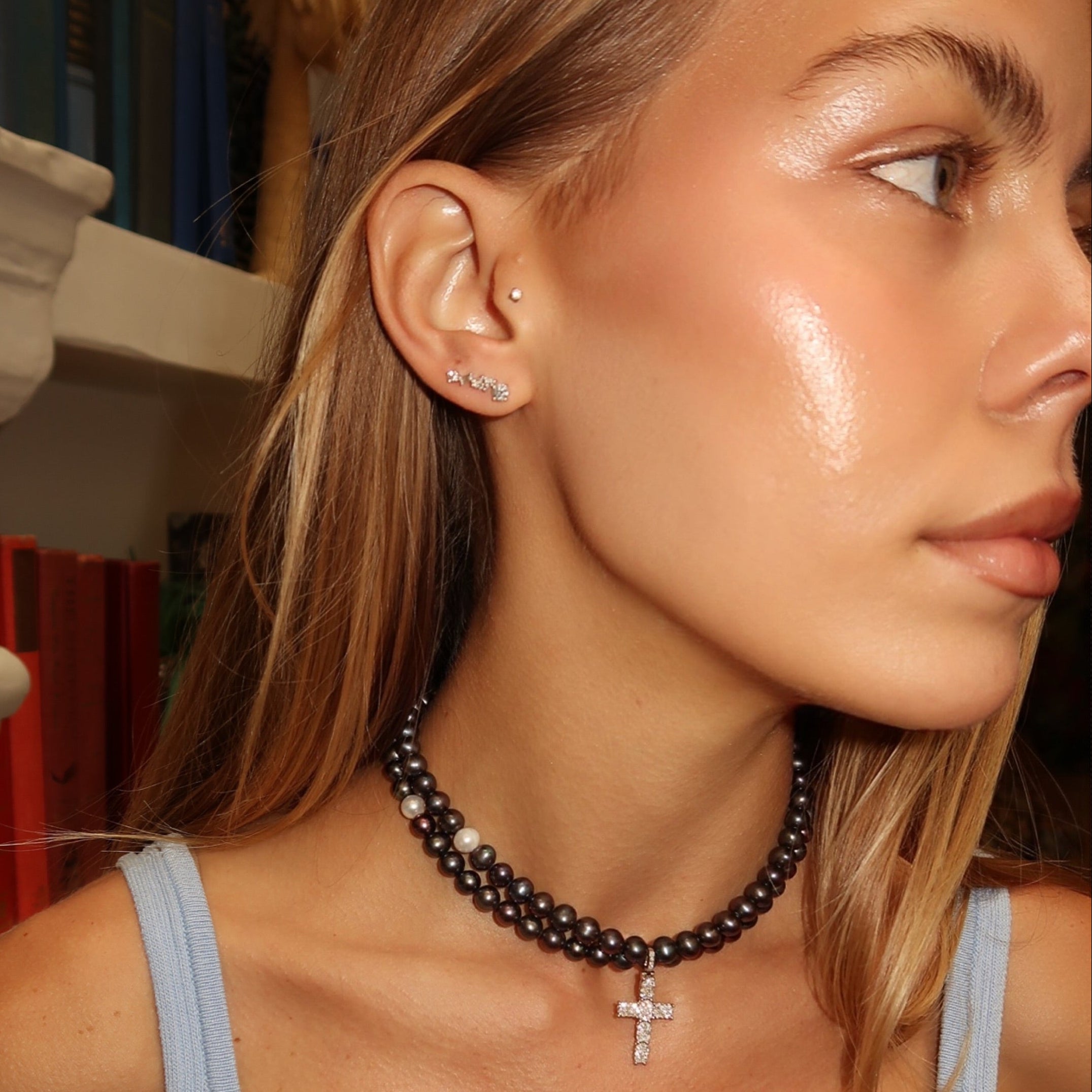 Social Climbers multi-shaped earring on model paired with Holy Water pearl choker—Waltz Diamonds