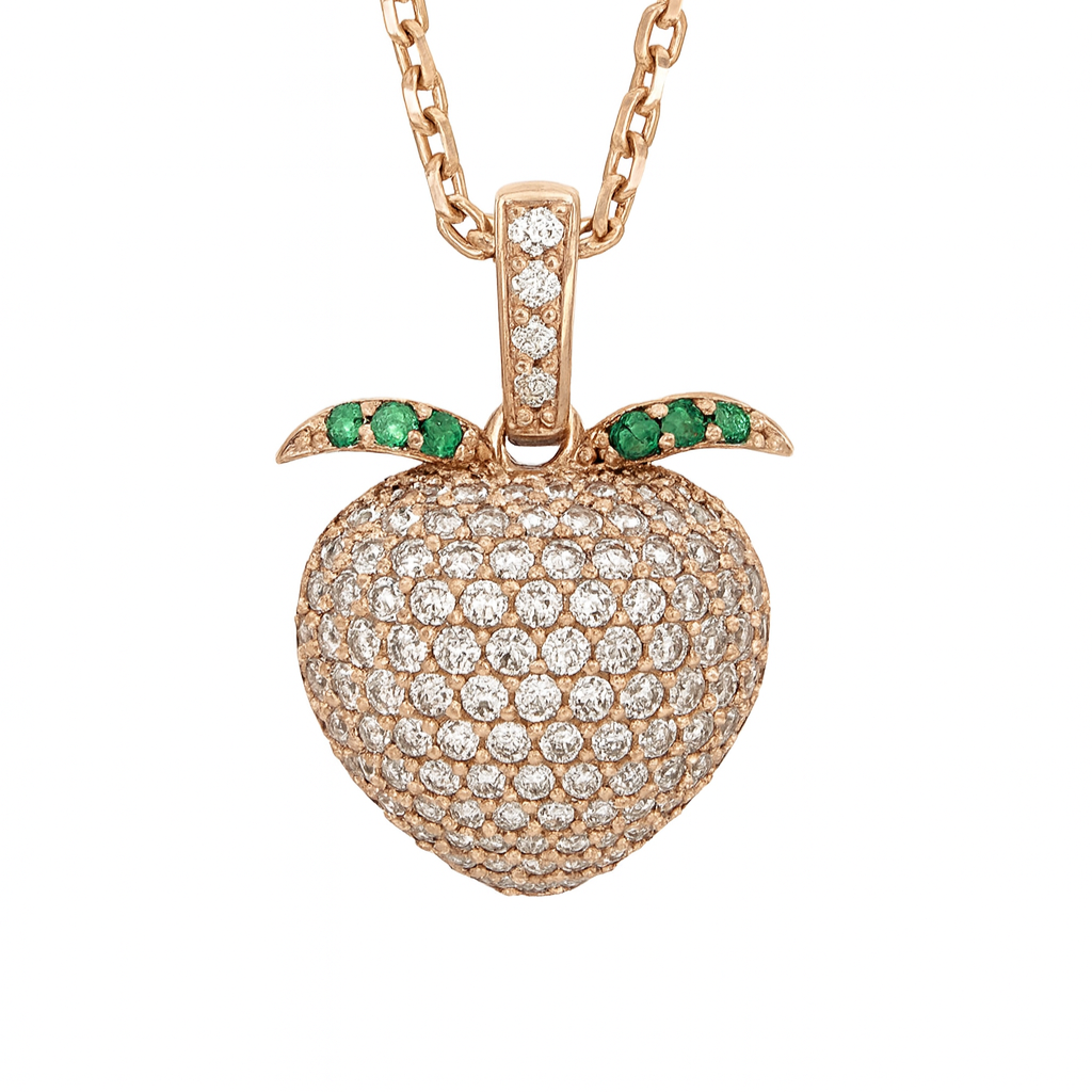 Peach-shaped pendant necklace in rose gold featuring lab diamonds and emeralds.